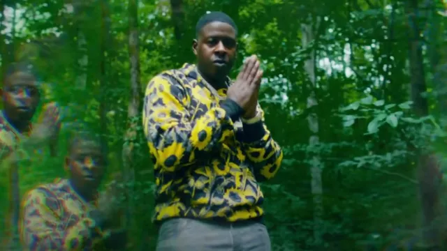 Veinte sudaderas con capucha de girasol negras y amarillas de Montreal usadas por Blac Youngsta en línea recta (video oficial)