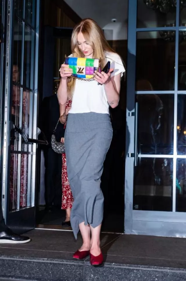 The Row Satin Ballet Flats worn by Sophia Turner in New York City on September 21, 2023