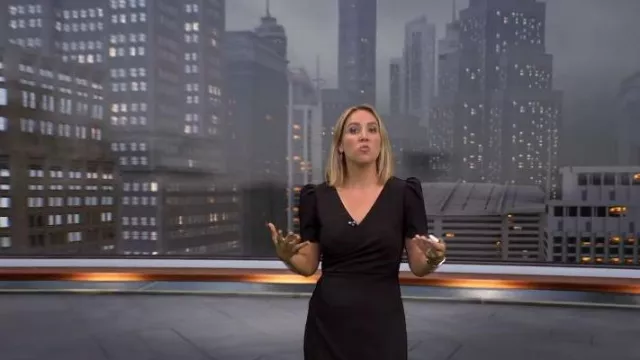 Express V-Neck Puff Sleeve Faux Wrap Sheath Midi Dress worn by Alexandra Wilson as seen in CBS Evening News  on  September 25, 2023