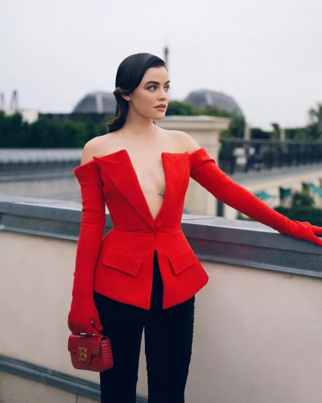 Balmain Off-The-Shoulder Peplum Top worn by  Lucy Hale at Balmain Show on September 27, 2023