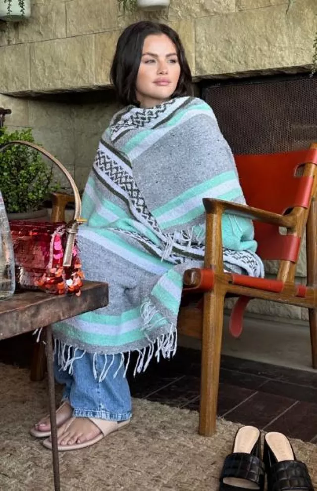Laguna Beach Textile Company Cabo Mexican Blanket worn by Selena Gomez  on her Instagram Story on August 12, 2023