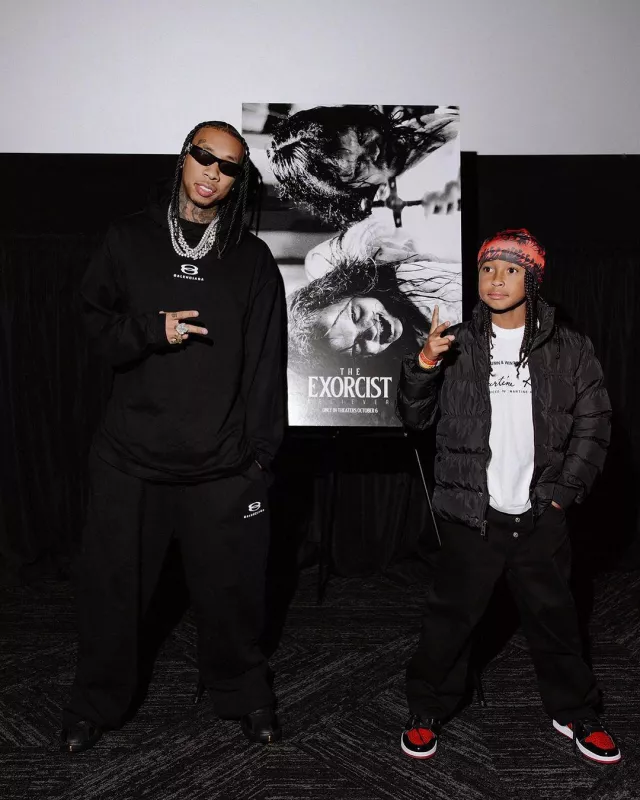 Nike Jordan 9 Retro Charcoal Gold sneakers worn by Tyga on his Instagram account @tyga