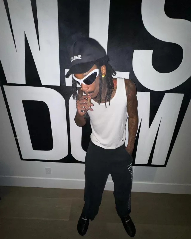 Balenciaga Eyewear White Warped Wire Cat Sun­glass­es worn by Wiz Khalifa on his Instagram account @wizkhalifa