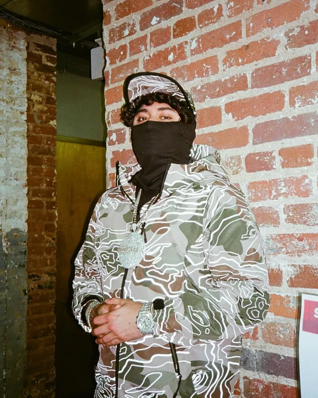 Bape Beige Line Camo Hooded Jacket worn by Ohgeesy on the Instagram account @ohgeesy
