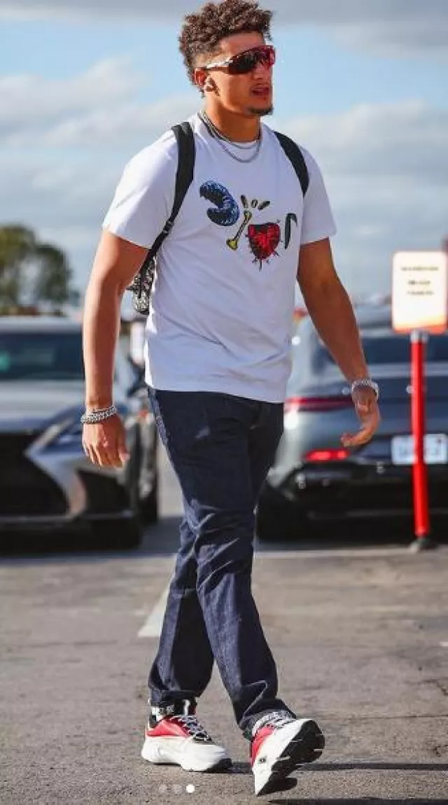 Oakley White & Orange 'Encoder Strike' Sunglasses worn by Patrick Mahomes II on the Instagram account @patrickmahomes