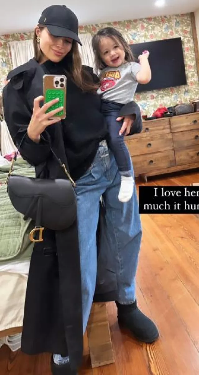 Dior Saddle Bag in Black Calfskin worn by Olivia Culpo on her Instagram Story on October 21, 2023