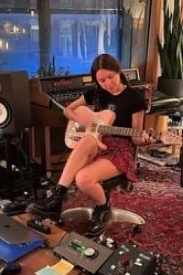 Tripp NYC Pleated Skirt in Red Plaid worn by Olivia Rodrigo on her Instagram post on October 23, 2023