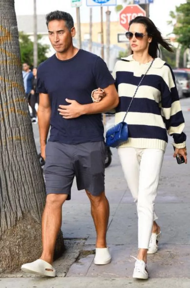 Chanel Timeless Mini Square Lamb Blue worn by Alessandra Ambrosio in Venice Beach on October 23, 2023