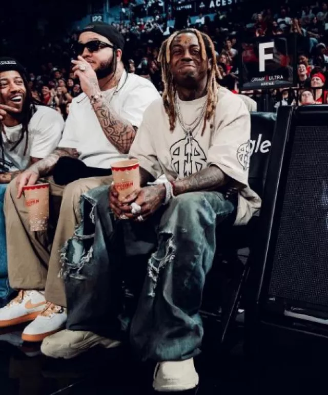 Balenciaga Dirty Backwards Destroyed Baggy Jeans worn by Lil Wayne on the Instagram account @liltunechi
