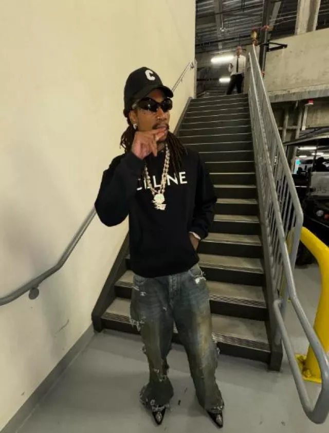 Balenciaga Black Warped Fennec Oval Sunglasses worn by Wiz Khalifa on the Instagram account @wizkhalifa