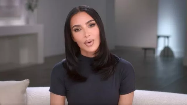 Skims Short Sleeve Mock Neck Tee worn by Kim Kardashian as seen in The Kardashians (S04E07)