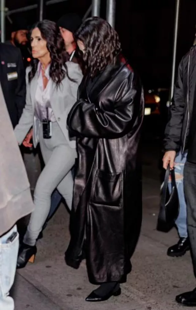 Alexander Wang Shawl Leather Coat worn by Selena Gomez in out in NYC on November 9, 2023