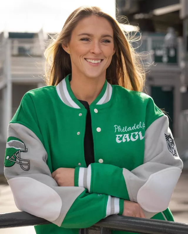 Team Philadelphia Eagles Varsity Jacket in Green worn by Kylie McDevitt on the Instagram account of @kykelce