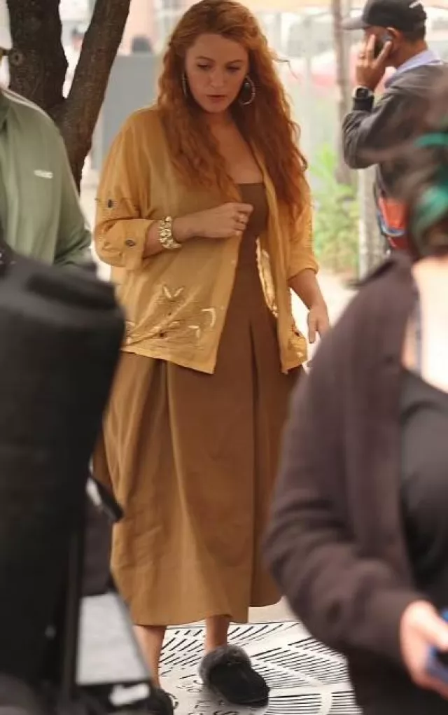 Bearpaw Lo­ki Slip­pers worn by Blake Lively  at  It Ends with Us post on June 7, 2023