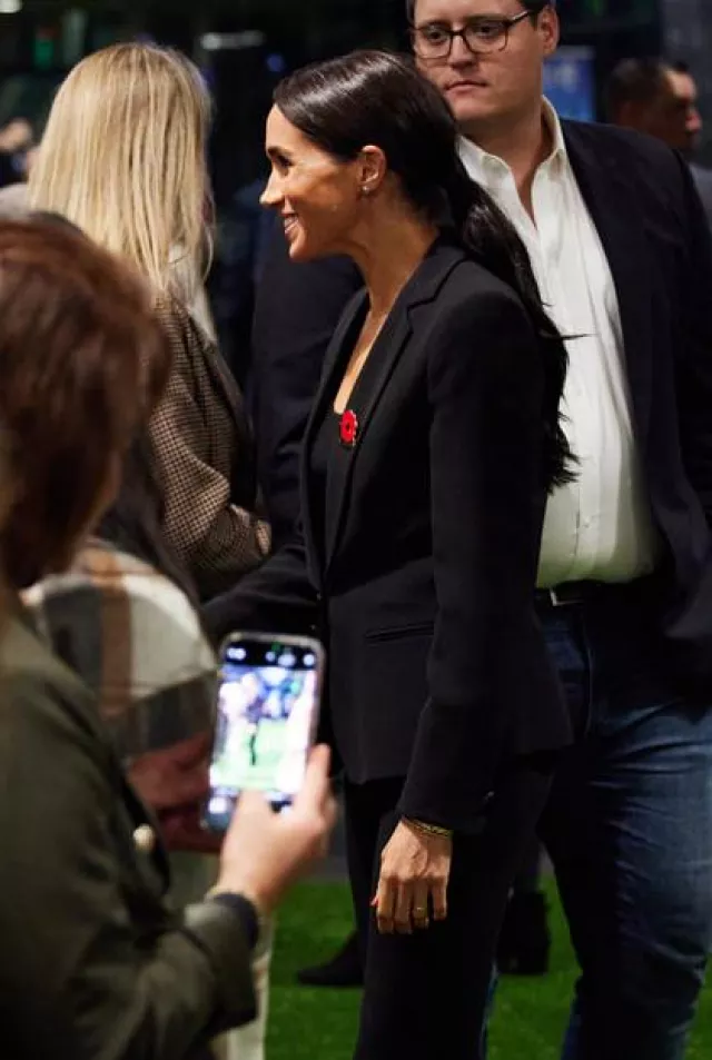 Giorgio Armani Mulberry Silk Single-Breasted Jacket in Black worn by Meghan Markle at Navy Seal Foundation Inauguration of the Warrior Fitness Program on November 8, 2023