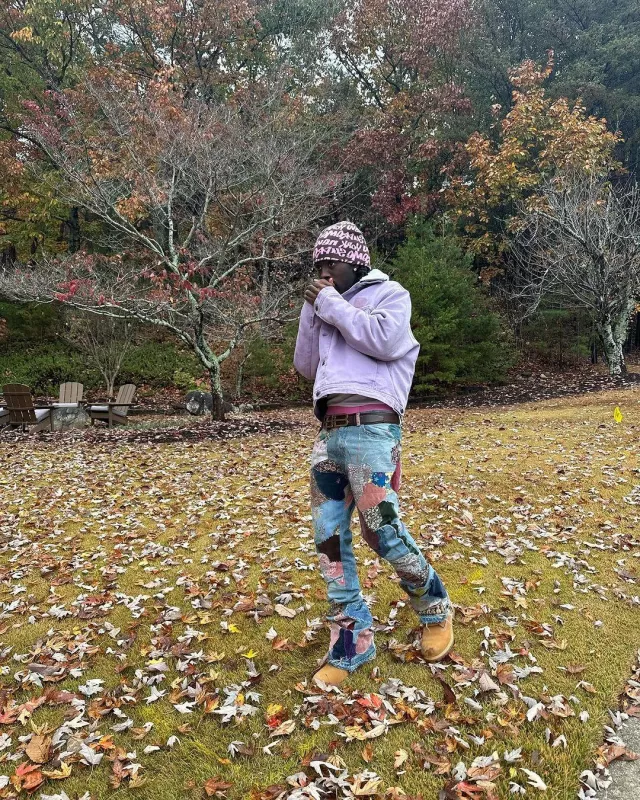 Supreme Brown & Pink Allover Graffiti Logo Beanie worn by Kai Cenat on the Instagram account @kaicenat