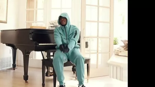 Nike Mineral Teal Fleece Joggers worn by Remble in "PAINT THE TOWN BLUE FREESTYLE" (OFFICIAL MUSIC VIDEO)