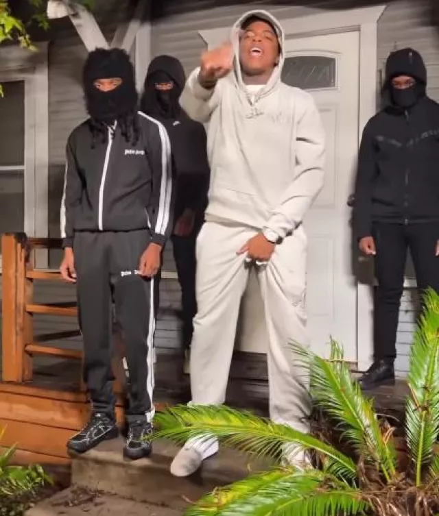 Amiri Grey Staggered Logo Hoodie worn by Yungeen Ace on the Instagram account @yungeenace