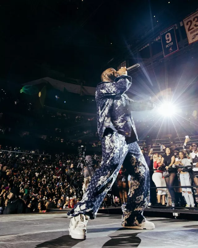 Louis Vuitton Blue Slashed Floral Print Jeans worn by Davido on the Instagram account @davido