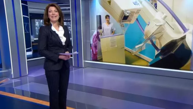 Alexander Mcqueen Pinstripe Wool Pants worn by Norah O'Donnell as seen in CBS Evening News on November 27, 2023
