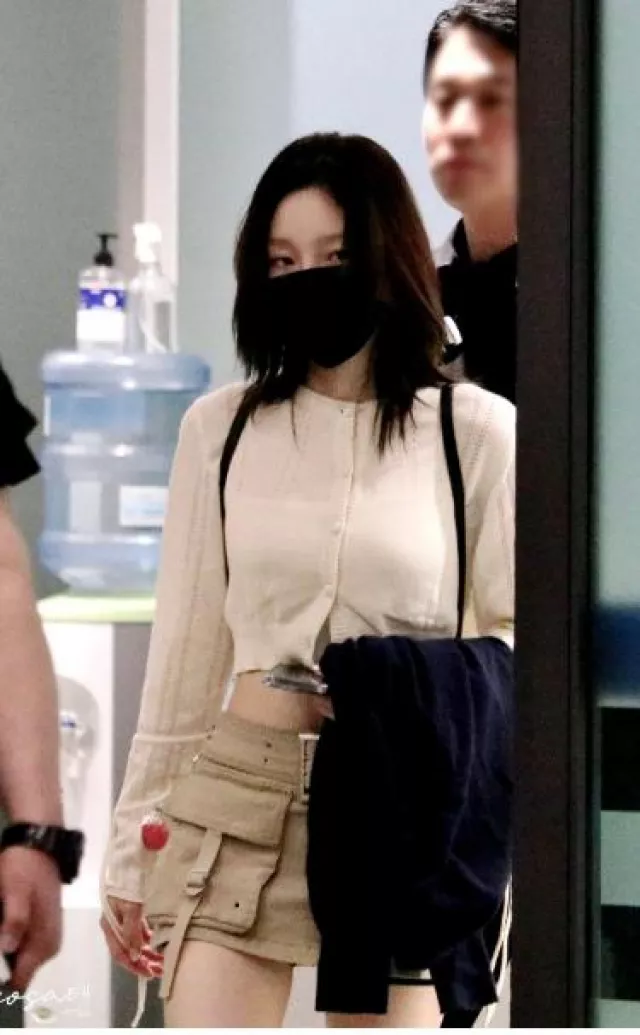 Odd One out Cargo Belt Skirt worn by Taeyeon at Incheon Airport on June 11, 2023
