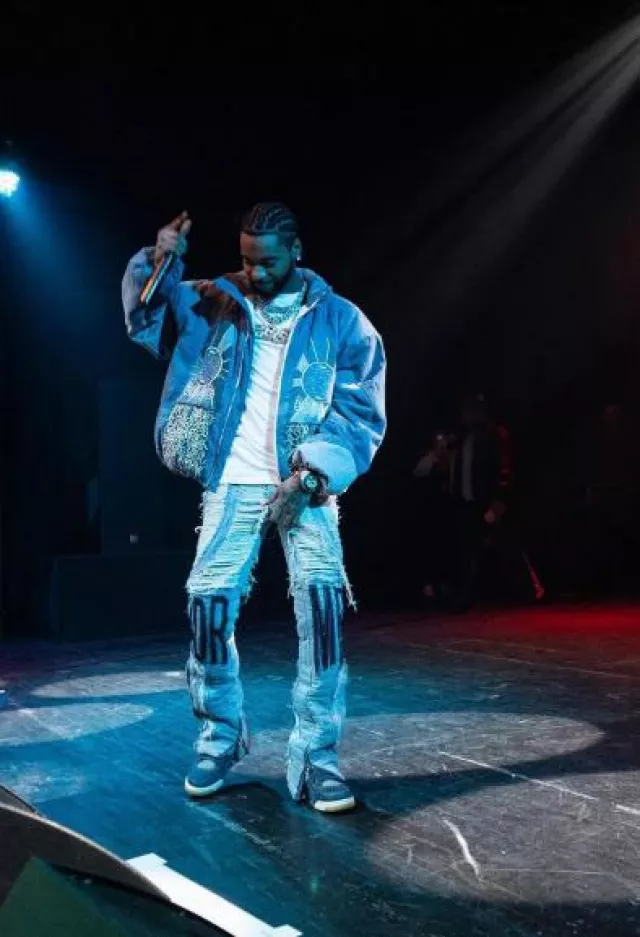 Who Decides War Blue Dis­tressed M­R­DR Mo­to Jeans worn by Key Glock on the Instagram account @keyglock