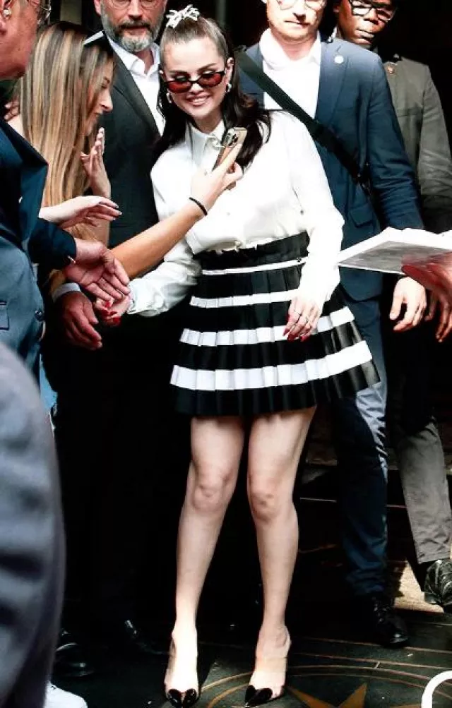 Alaia Caur Patent Leather and Pu Mules worn by Selena Gomez at Rare Beauty Event in Paris post on June 8, 2023