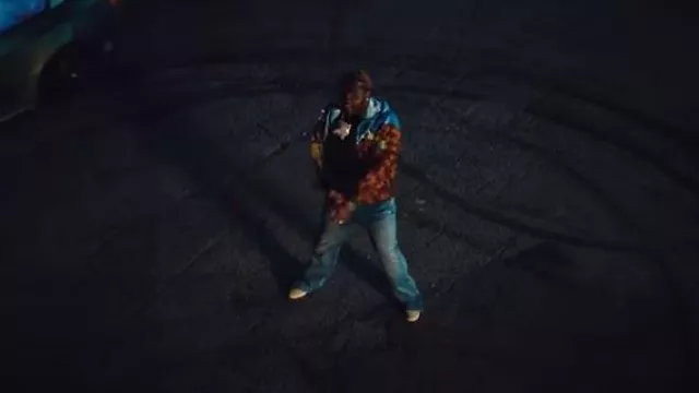 Amiri Clay Indigo Flared 'Stack' Jeans worn by Tee Grizzley in Floaters [Official Video]