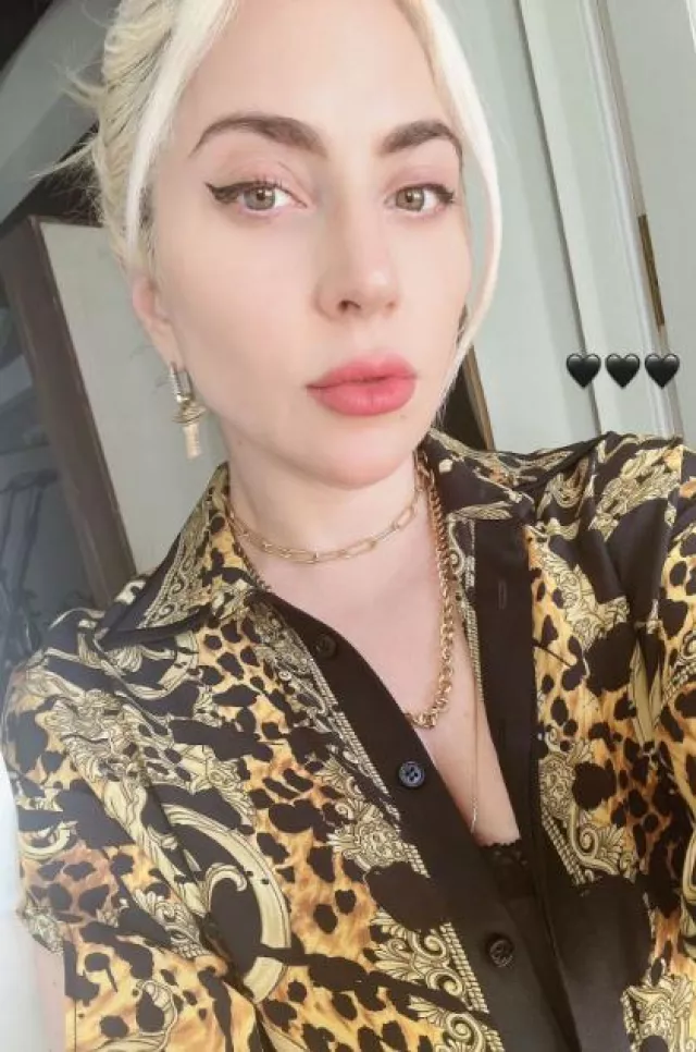 Versace Pre-Fall 2013 Cheetah and Baroque-Printed Silk Shirt worn by  Lady Gaga on her Instagram Story on December 5, 2023