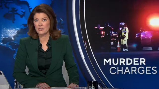 Michael Kors Collection Hansen Charmeuse Shirt in Forest worn by Norah O'Donnell as seen in CBS Evening News on December 8, 2023