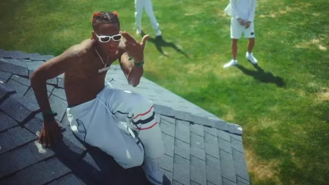 Prada White & Red-Logo Stripe Shell Pants worn by Famous Dex in Big Dawg music video by Famous Dex, Rich The Kid & Jay Critch