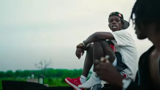 Nike Air Force Low Red Out­line Swoosh sneakers worn by Quando Rondo in CASH (Official Video) [Snippet]