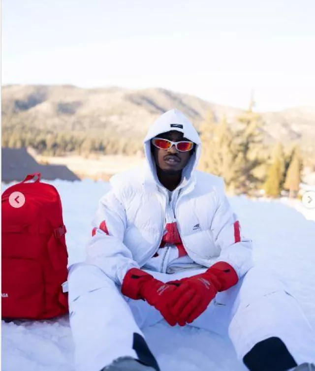 Balenciaga Red Ski Backpack worn by Lil Tjay on the Instagram account @liltjay