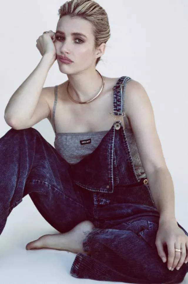 Miu Miu Long Washed Velvet Overalls worn by  Emma Roberts at Grazia Usa on December 11, 2023