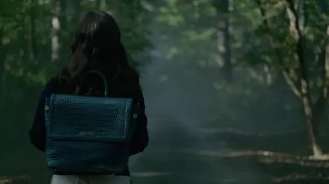 Geen leather backpack worn by Cairo Sweet (Jenna Ortega) as seen in Miller's Girl