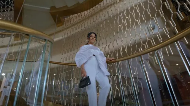 Gaby Charbachy Flared White Crepe Pants worn by Farhana Bodi as seen in Dubai Bling (S02E03)