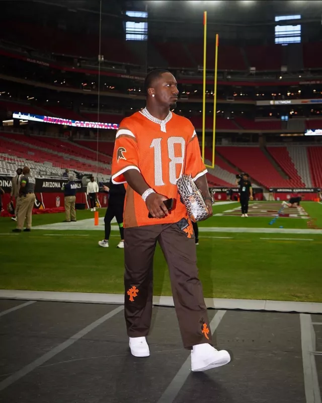Chrome Hearts Orange & Camo Cross Patch Brown Pants worn by Deebo Samuel on the Instagram account @19problemz