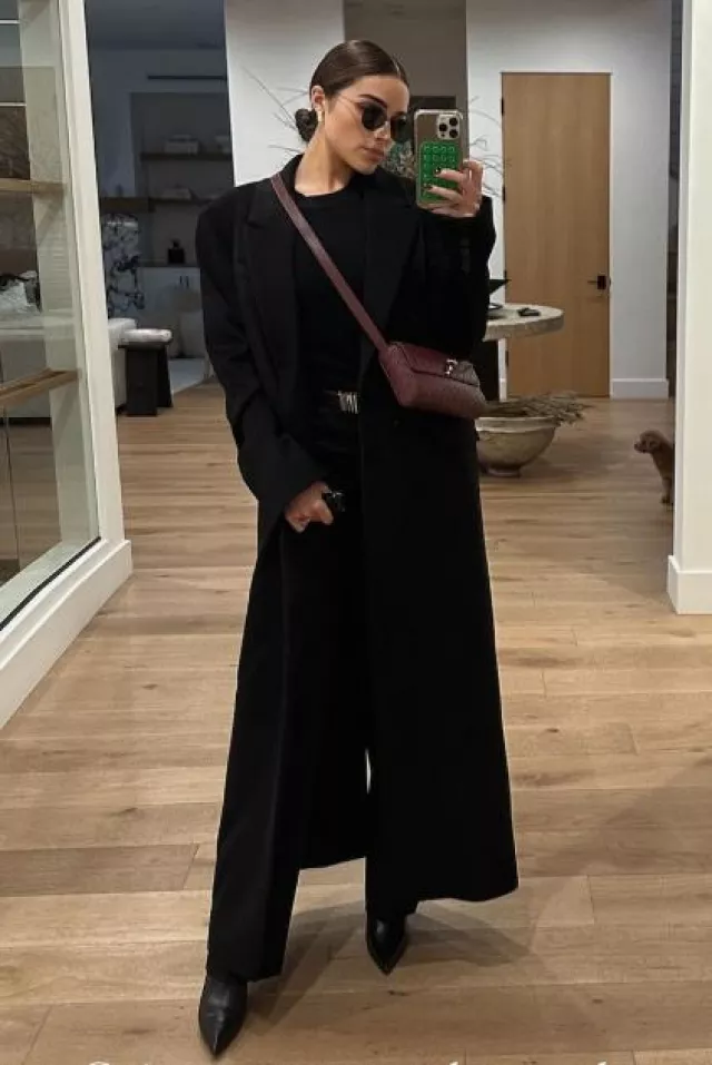 Anine Bing Carrie Pant worn by Olivia Culpo on her Instagram Story on December 21, 2023