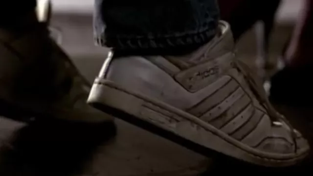 The pair of Adidas Originals sneakers worn by Axel Foley (Eddie Murphy) in the movie Beverly Hills Cop 2 Adidas Conference Low