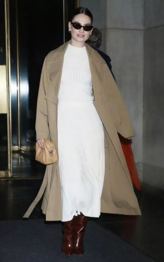 Lafayette 148 Convertible Cotton Twill Trench Coat worn by Lily James at The Today Show on December 18, 2023