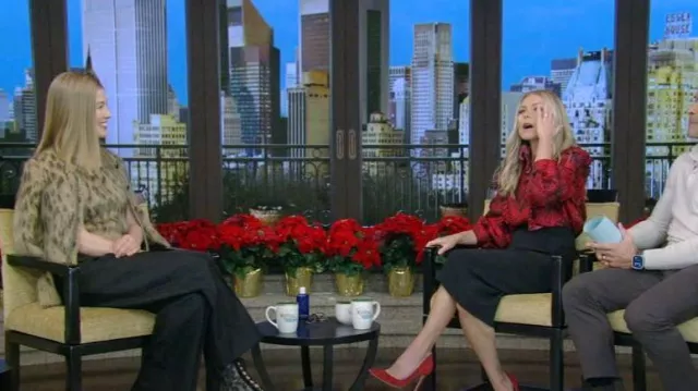 Gucci Silk Tiger Print Tie Neck Blouse worn by Kelly Ripa as seen in LIVE with Kelly and Mark on December 26, 2023