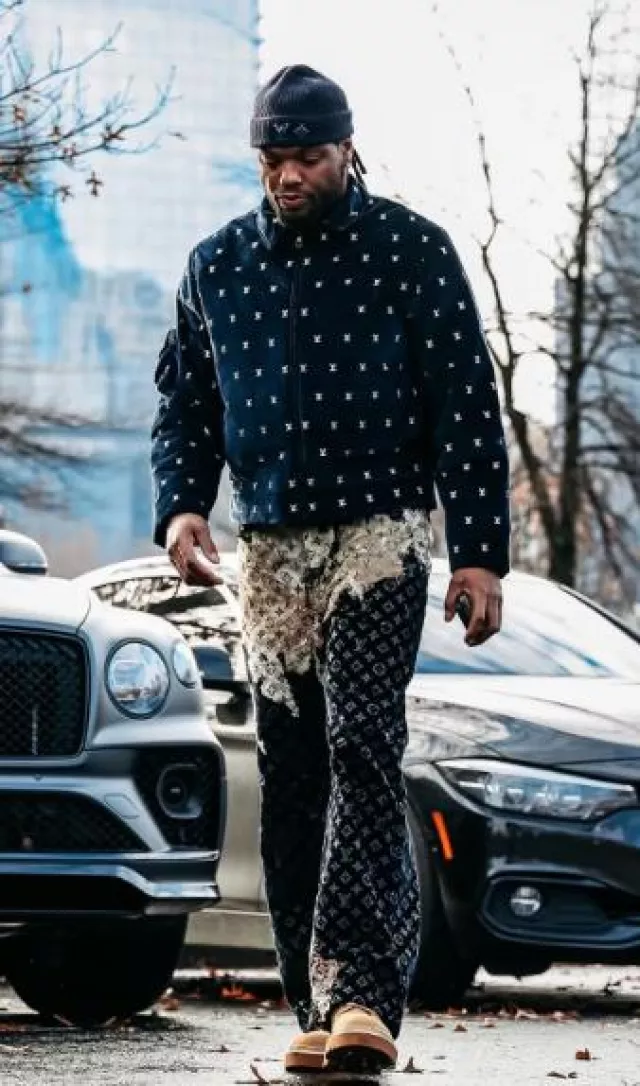 Louis Vuitton Navy Allover Mi­ni LV Vel­vet Jack­et worn by Derrick Henry on the Instagram account @imdroc15