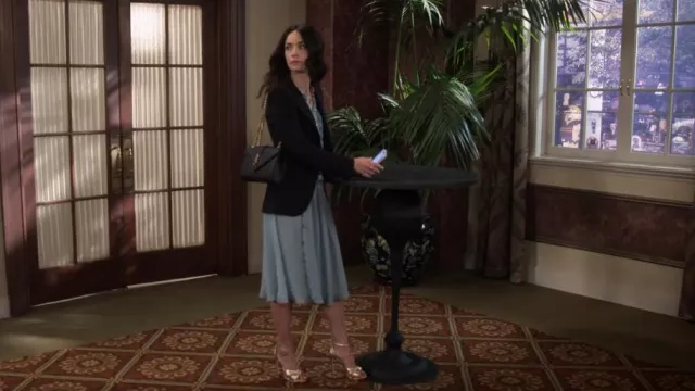 Saint Laurent Medium Cassandra Quilted Bag worn by Julia Mariano (Abigail Spencer) as seen in Extended Family (S01E01)