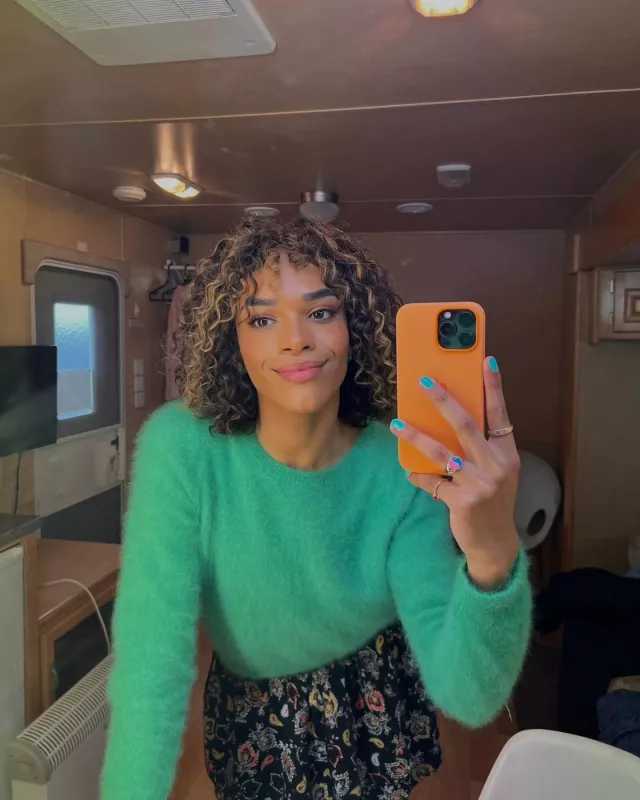 Green sweater worn by Yasmin Finney on her Instagram account @yazdemand
