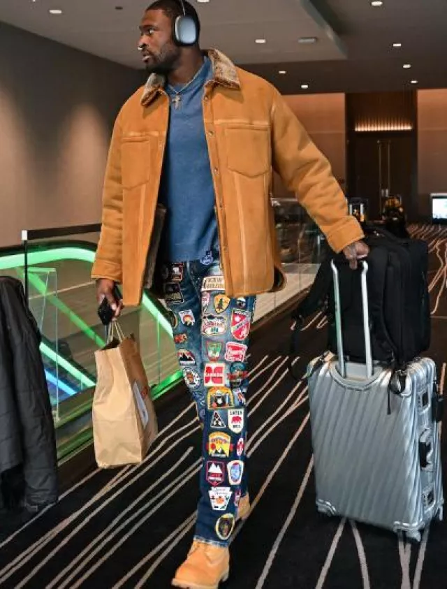 Dsquared2 Deep Indigo Allover Logo Patches Jeans worn by DK Metcalf on the Instagram account @dk14