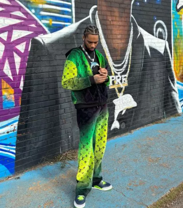 Louis Vuitton Green & Black Gradient Velvet Trackpants worn by Key Glock on the Instagram account @keyglock