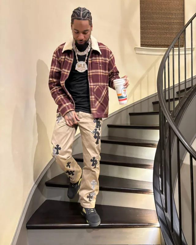Chrome Hearts Khaki Pants with Black & Checkered Cross Patches worn by Key Glock on the Instagram account @keyglock