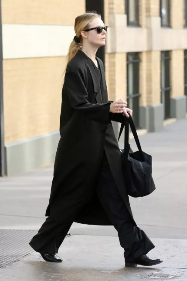 The Row Clovis Bag worn by Elle Fanning in New York City on January 3, 2024