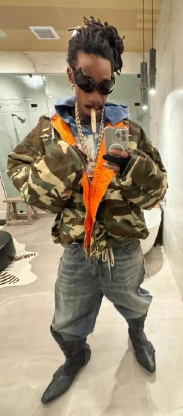 Vetements x Alpha Industries Camo Hooded Bomber Jacket worn by Wiz Khalifa on the Instagram account @wizkhalifa