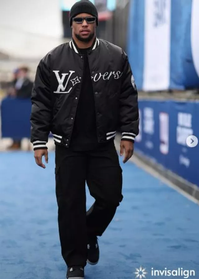 Louis Vuitton Black LV Lovers Bomber Jack­et worn by Saquon Barkley on the Instagram account @saquon